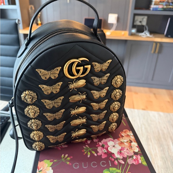 Gucci Handbags - Gucci Black Backpack with Gold Insect Accents